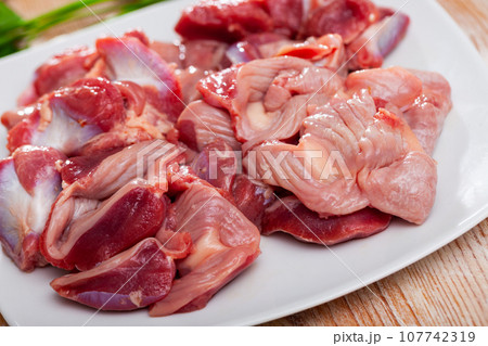 Closeup of fresh raw chicken gizzards 107742319