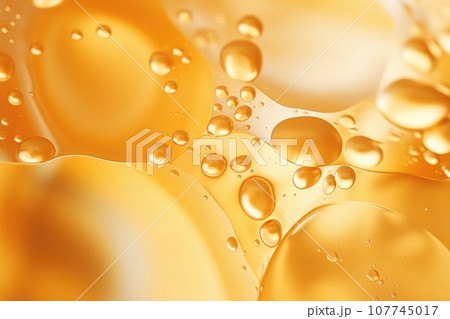 Oil bubbles background, gold liquid with golden drops. Oil bubbles background, gold liquid with golden drops. 107745017