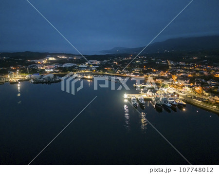Aerial night view of Killybegs, the most important fishing harbour town in Ireland, County Donegal Aerial night view of Killybegs, the most important fishing harbour town in Ireland, County Donegal 107748012