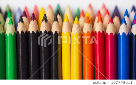 colored pencils background. many bright colored pencils in several rows. Generative AI colored pencils background. many bright colored pencils in several rows. Generative AI 107748611