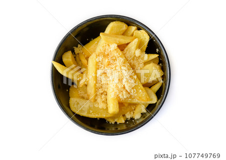 Top view Potato fries on black plate isolated on white background. Top view Potato fries on black plate isolated on white background. 107749769