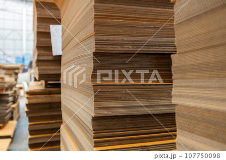 Cardboard box, pile of paper warehouse storage paper. Goods storehouse. import-export industry. 107750098