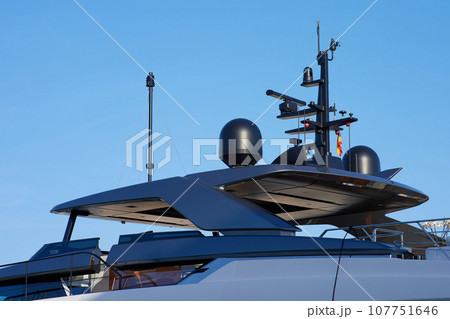 Navigation system on a yacht against a blue sky. 107751646