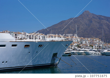Luxury yacht marina. Vacations And Tourism Concept, Beautiful white modern yachts at sea port. Luxury yacht marina. Vacations And Tourism Concept, Beautiful white modern yachts at sea port. 107751875