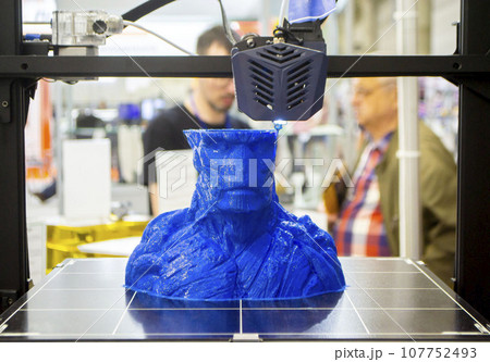 3D printer printing object close-up. Process creating three-dimensional model on 3d printer. Additive printer technology. 3D Prototyping. 3D design modeling. New modern innovation printing technology 3D printer printing object close-up. Process creating three-dimensional model on 3d printer. Additive printer technology. 3D Prototyping. 3D design modeling. New modern innovation printing technology 107752493
