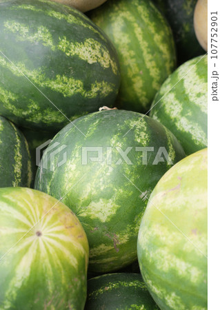close up of slice of water melon on white background . 107752901