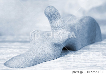 Human joint bone prototype 3D printer printed from polyamide powder close-up. Technology Multi Jet Fusion, MJF. Three-dimensional medical model created on 3D printer from plastic. 3D medical modeling 107755182