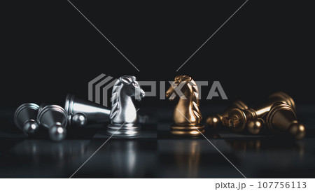 Gold and silver chess pieces in chess board game for business comparison. Leadership concepts, human resource management concepts, business administration concepts. Gold and silver chess pieces in chess board game for business comparison. Leadership concepts, human resource management concepts, business administration concepts. 107756113