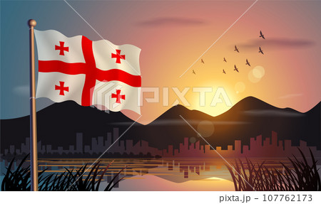 Georgia Republic flags flutter against the sunrise sky and beautiful lake. Celebrating national day and travel tourism 107762173