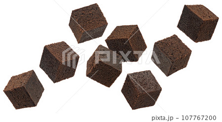 Chocolate brownie cubes isolated on white background, full depth of field Chocolate brownie cubes isolated on white background, full depth of field 107767200
