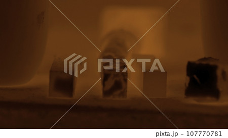 Metal details inside a furnace. Steel parts inside the furnace. Metallurgy 107770781