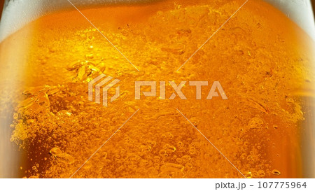 Detail of Pouring Beer Into Glass, Close-up. 107775964