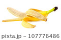 Half-peeled banana on a white background isolated. 107776486