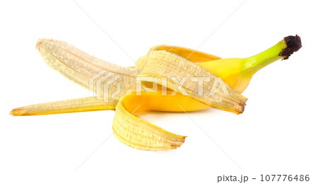 Half-peeled banana on a white background isolated. 107776486