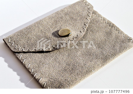 Gray velvet money and credit card wallet, isolated on white background Gray velvet money and credit card wallet, isolated on white background 107777496