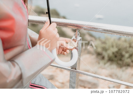 Wedding heart golden lock on stainless iron fence valentines day symbol of eternal love a wedding Wedding heart golden lock on stainless iron fence valentines day symbol of eternal love a wedding 107782072
