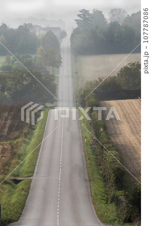 a long strip of asphalt 107787086