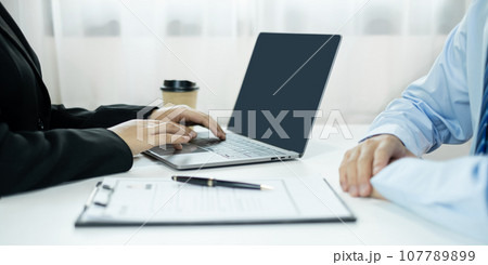 Business people hold a resume and talk to job applicants for job interviews about careers and Their personal history in the company. Recruitment concepts 107789899