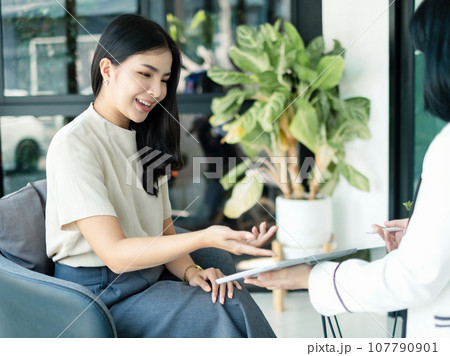 Female CEO and businesswoman meeting to discuss business plan displayed on screen laptop analyze and calculate planning strategies. business success process Female CEO and businesswoman meeting to discuss business plan displayed on screen laptop analyze and calculate planning strategies. business success process 107790901