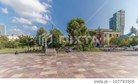 Panorama showing the Skanderbeg memorial and Ethem Bey mosque on the main square in Tirana timelapse, Albania 107793916