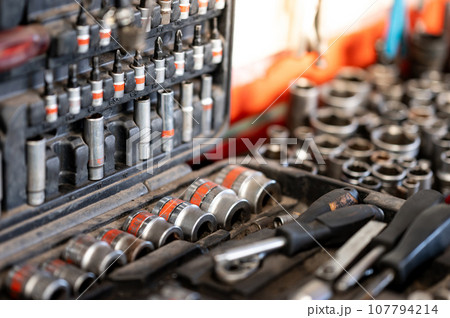 Box of screwdriver bit pieces and drive socket wrench set 107794214