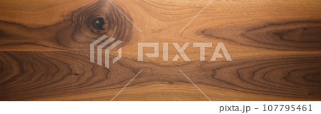 Real long american black walnut with sapwood honey color texture after exposure to the sun for 3 years with oil finish 107795461