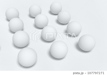 Set of golf ball lying in row on monochrome background 107797271