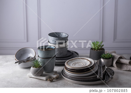Craft ceramic plates, bowls and cups 107802885