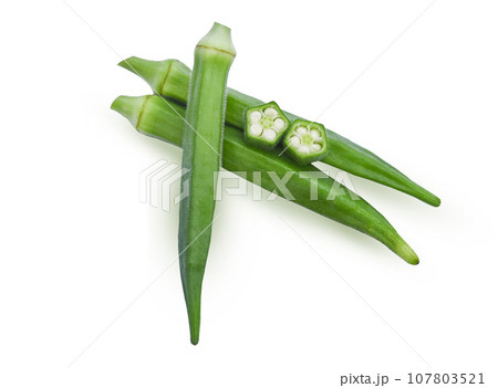 Top view of fresh okra ;sliced  isolated on white background. 107803521