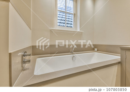 a bathroom with a sink and window in the corner, taken from above to see how it looks like this a bathroom with a sink and window in the corner, taken from above to see how it looks like this 107803850