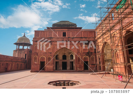 Decorative ritual pool( fountain) in Red Fort of Agra, India. Under renovation. Decorative ritual pool( fountain) in Red Fort of Agra, India. Under renovation. 107803897