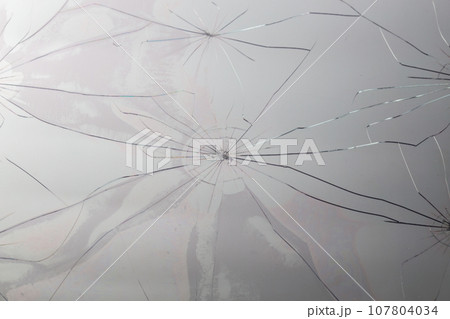 close-up view of slanted broken LCD screen with visible pixel grid and selective focus 107804034