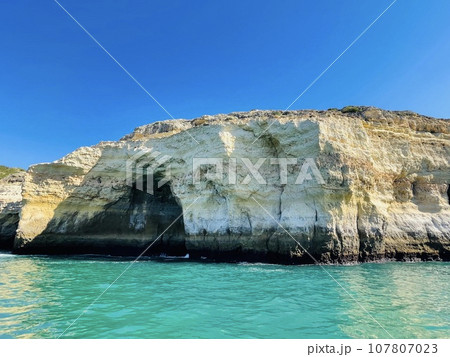 Beautiful view of Benagil Cave in Carvoeiro Algarve Portugal Beautiful view of Benagil Cave in Carvoeiro Algarve Portugal 107807023