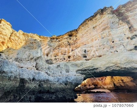 Beautiful view of Benagil Cave in Carvoeiro Algarve Portugal Beautiful view of Benagil Cave in Carvoeiro Algarve Portugal 107807060
