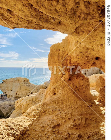 Reef formation from sandstone on the coast.Algar Seco, Carvoeiro. 107807946