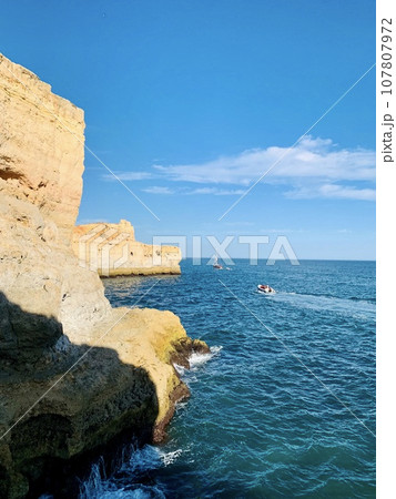 Reef formation from sandstone on the coast.Algar Seco, Carvoeiro. 107807972