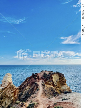 Reef formation from sandstone on the coast.Algar Seco, Carvoeiro. 107807973