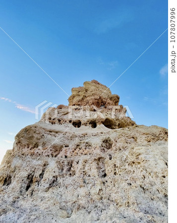 Reef formation from sandstone on the coast.Algar Seco, Carvoeiro. 107807996