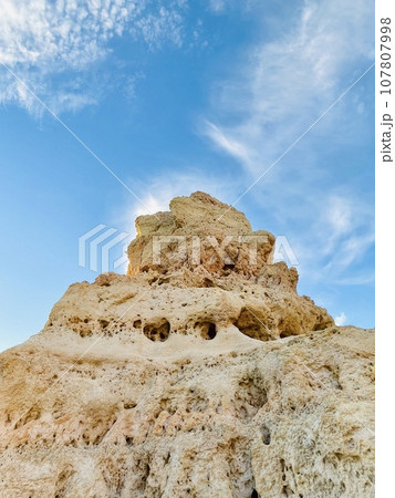 Reef formation from sandstone on the coast.Algar Seco, Carvoeiro. 107807998