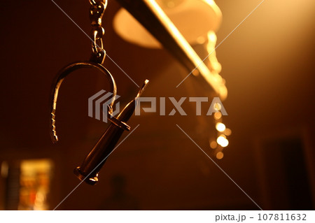 Criminal hands with Police Handcuffs Criminal hands with Police Handcuffs 107811632