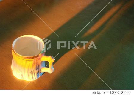 Cup on the table Cup on the table 107812516