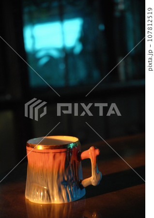 Cup on the table Cup on the table 107812519