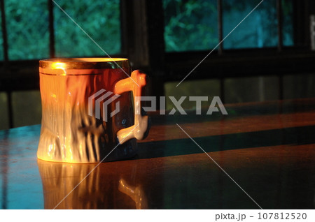 Cup on the table Cup on the table 107812520