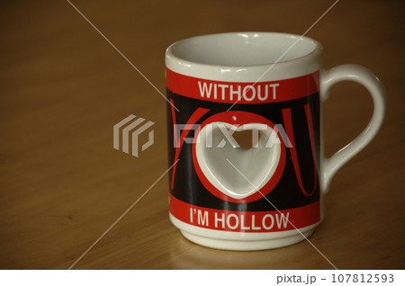 Cup on the table Cup on the table 107812593