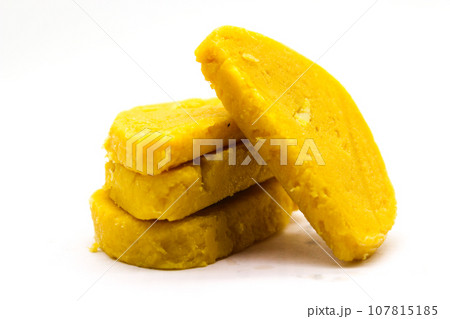 Gram flour sweets on white background with selective focus Gram flour sweets on white background with selective focus 107815185