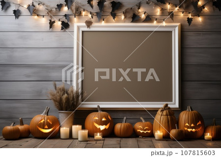 Mockup of scary pumpkins, candles, paper bats and leaves with empty frame. Generative AI 107815603