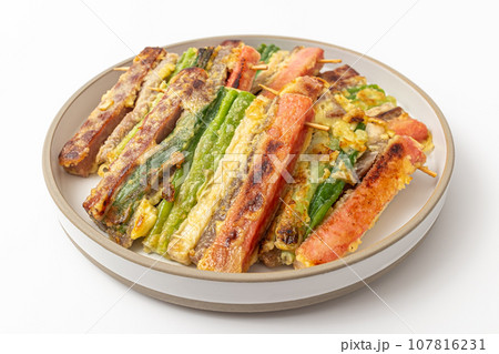 Korean holiday food skewers Jeon on white background Korean holiday food skewers Jeon on white background 107816231