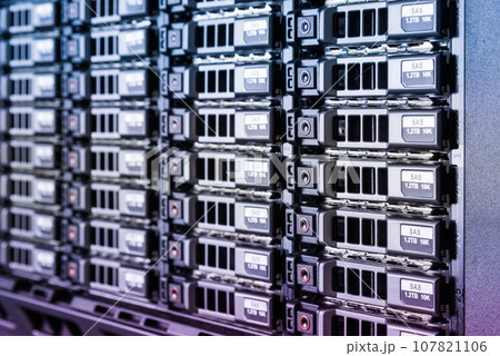 Row of hard drives serving as data storage inside server room Row of hard drives serving as data storage inside server room 107821106