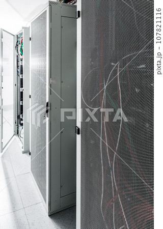Shot of datacenter with server racks 107821116