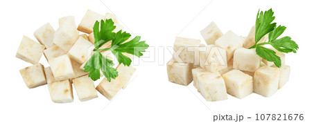 diced celery root with leaf isolated on white background. Top view. Flat lay. diced celery root with leaf isolated on white background. Top view. Flat lay. 107821676
